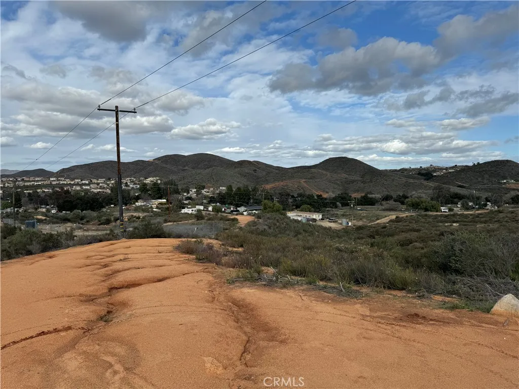 16 Orange Street Menifee, CA 92584 - Photo 11 of 14 a view of a lake with a mountain in the background