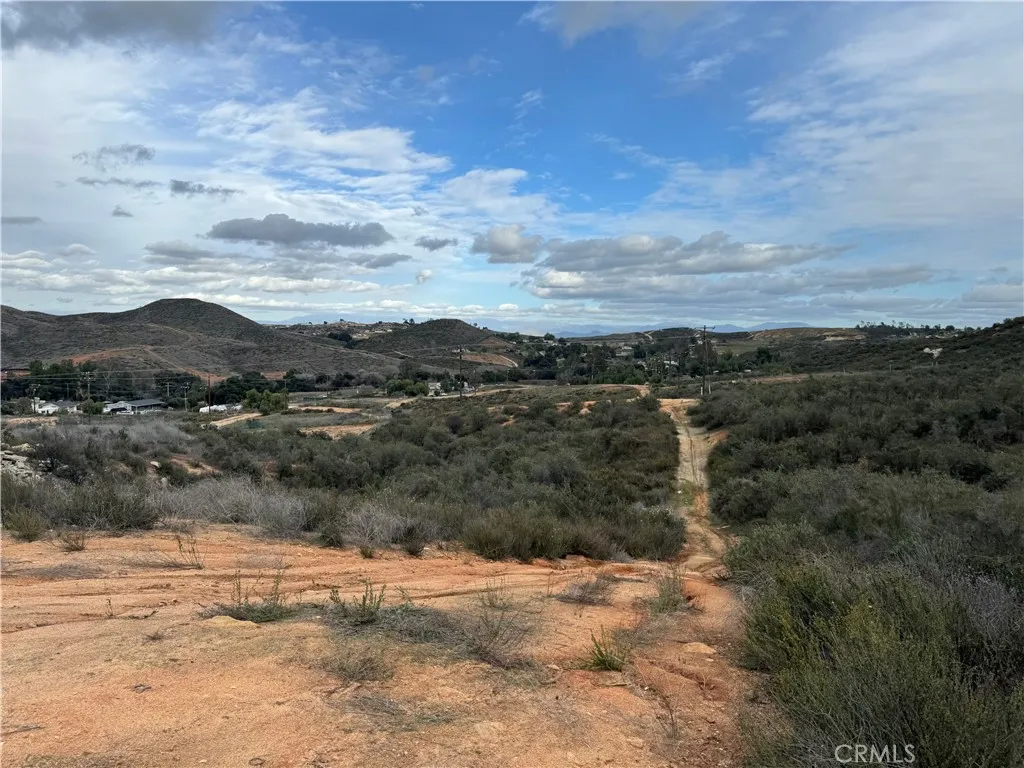 16 Orange Street Menifee, CA 92584 - Photo 7 of 14 a view of a dry yard with mountains
