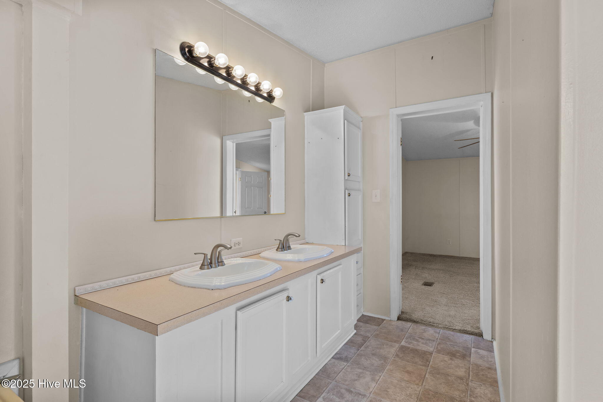 758 Wetherington Landing Road Stella, NC 28582 - Photo 22 of 49 Double vanities w/ porcelain sinks