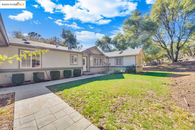 a view of a house with a swimming pool