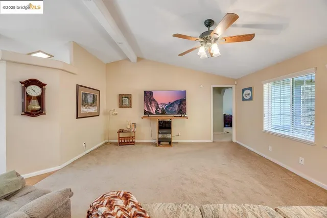 a view of a livingroom with a flat screen tv