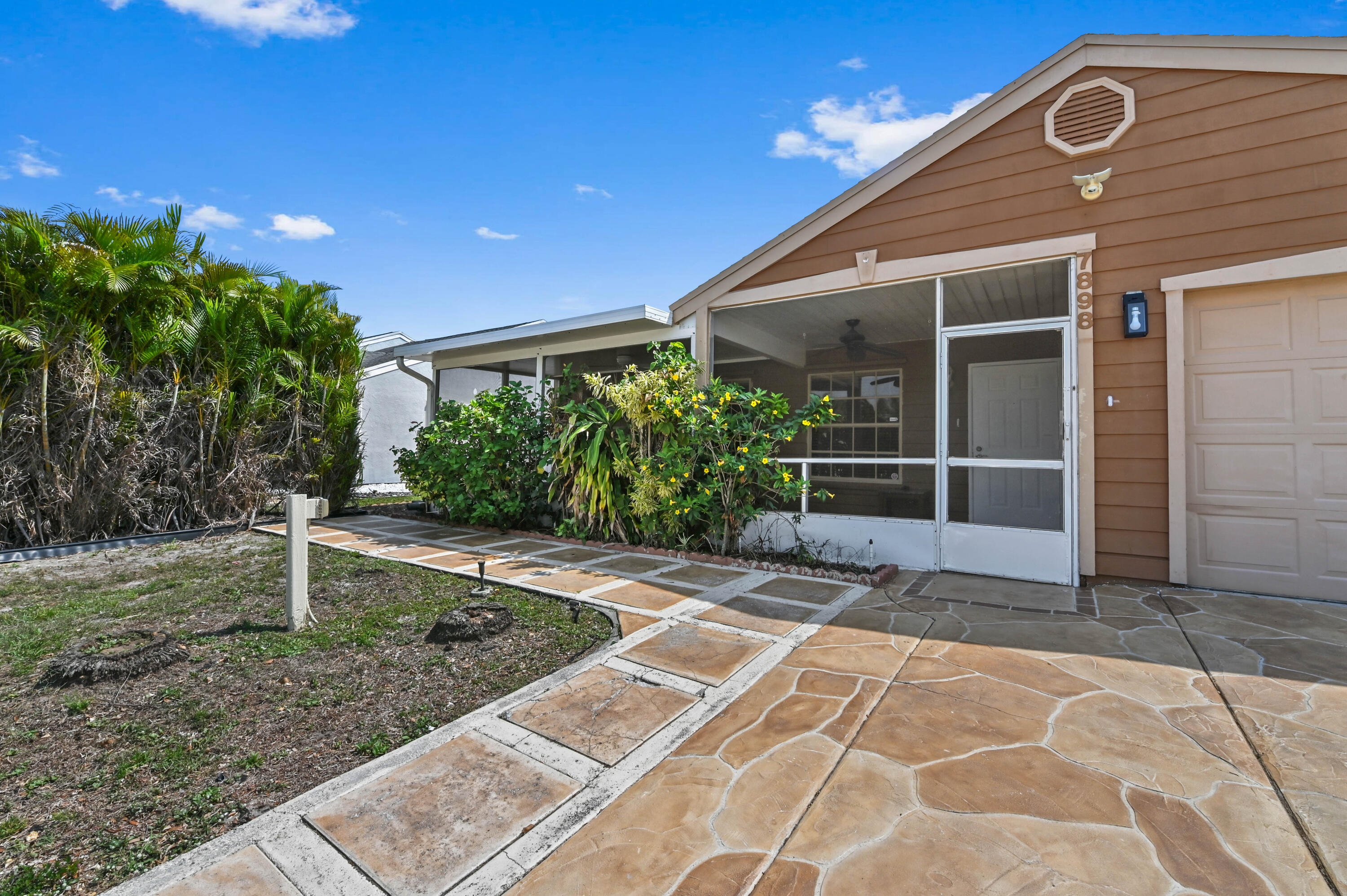 7898 Ridgewood Drive Lake Worth, FL 33467 - Photo 2 of 26 03 Entry 01