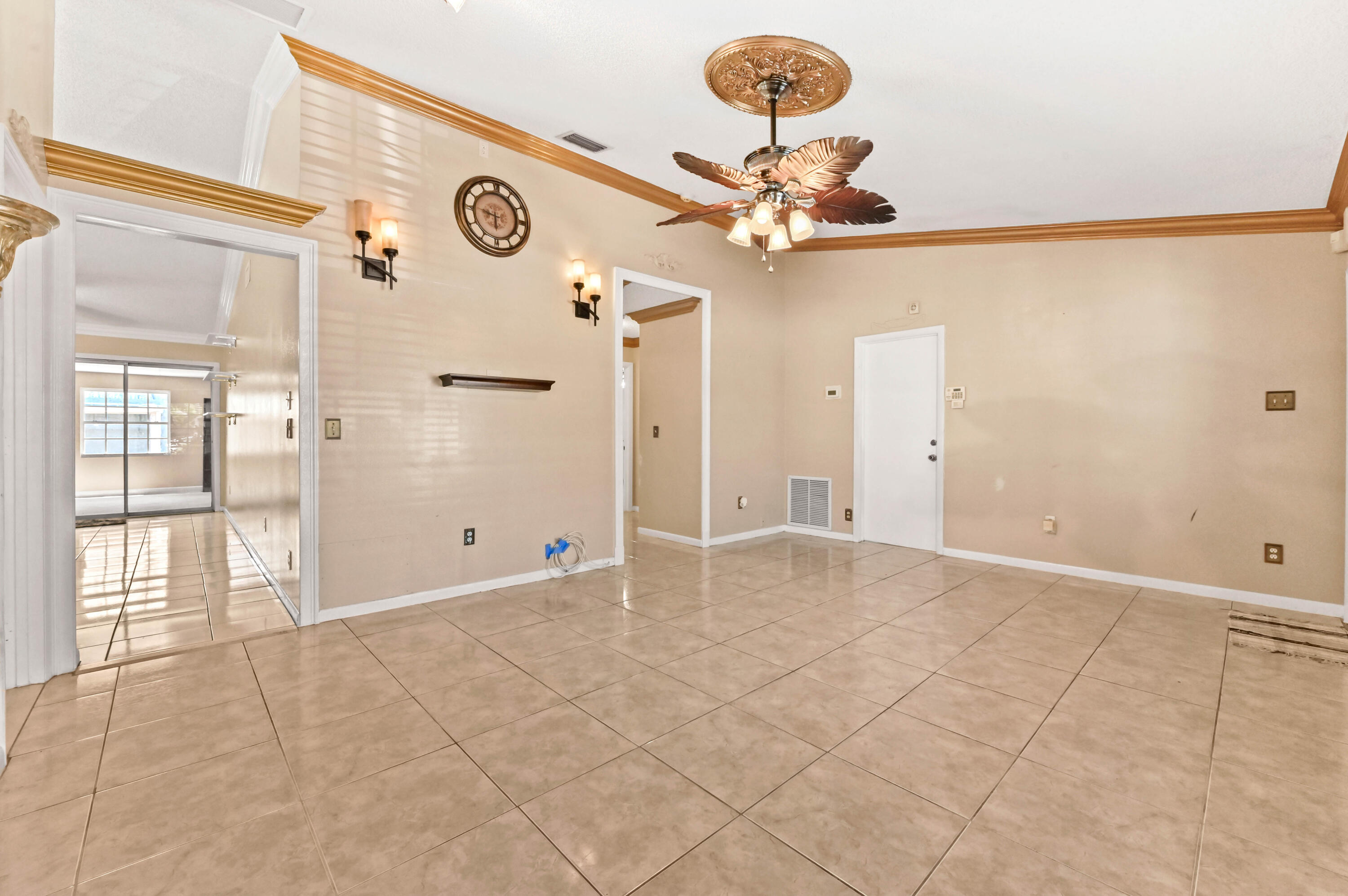 7898 Ridgewood Drive Lake Worth, FL 33467 - Photo 4 of 26 06 Living room 03