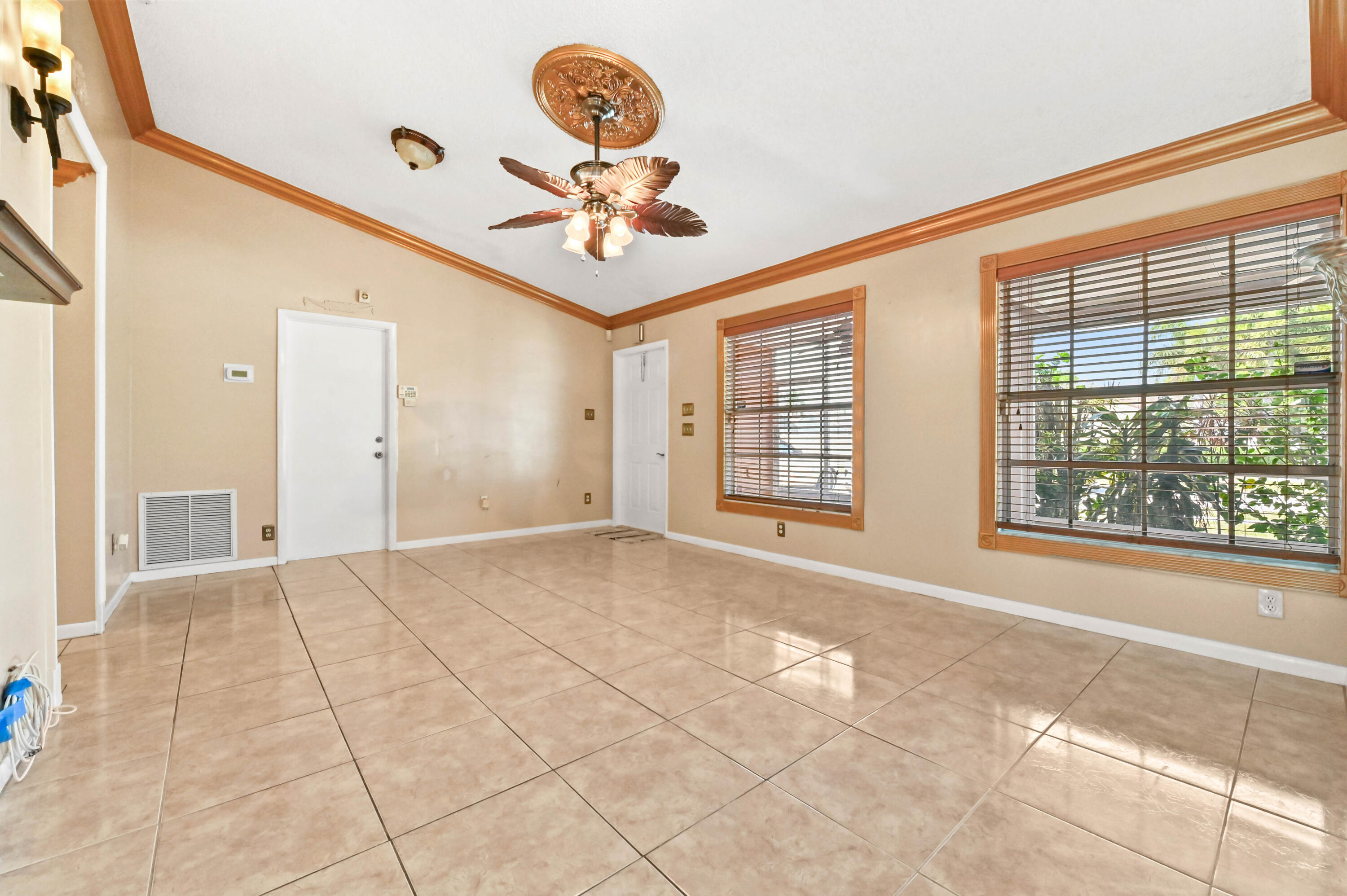7898 Ridgewood Drive Lake Worth, FL 33467 - Photo 5 of 26 07 Living room 04