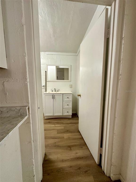 647 Northeast Waldo Road Gainesville, FL 32641 - Photo 11 of 25 a view of a kitchen from the hallway