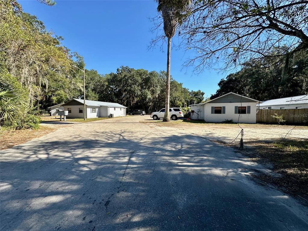 647 Northeast Waldo Road Gainesville, FL 32641 - Photo 22 of 25 a view of a house with snow on the road
