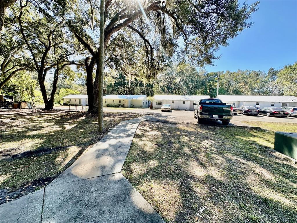 647 Northeast Waldo Road Gainesville, FL 32641 - Photo 24 of 25 a view of street with trees