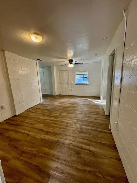 647 Northeast Waldo Road Gainesville, FL 32641 - Photo 4 of 25 a view of a room with wooden floor