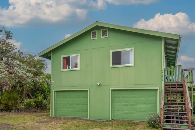 a view of a chairs and table in the patio