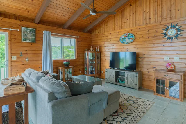 a view of a chairs and table in patio