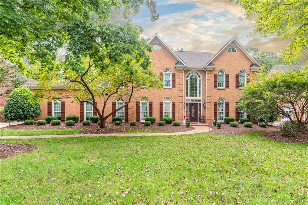 4801 Nora's Path Road Charlotte, NC 28226 - Photo 1 of 2 a front view of a house with a yard