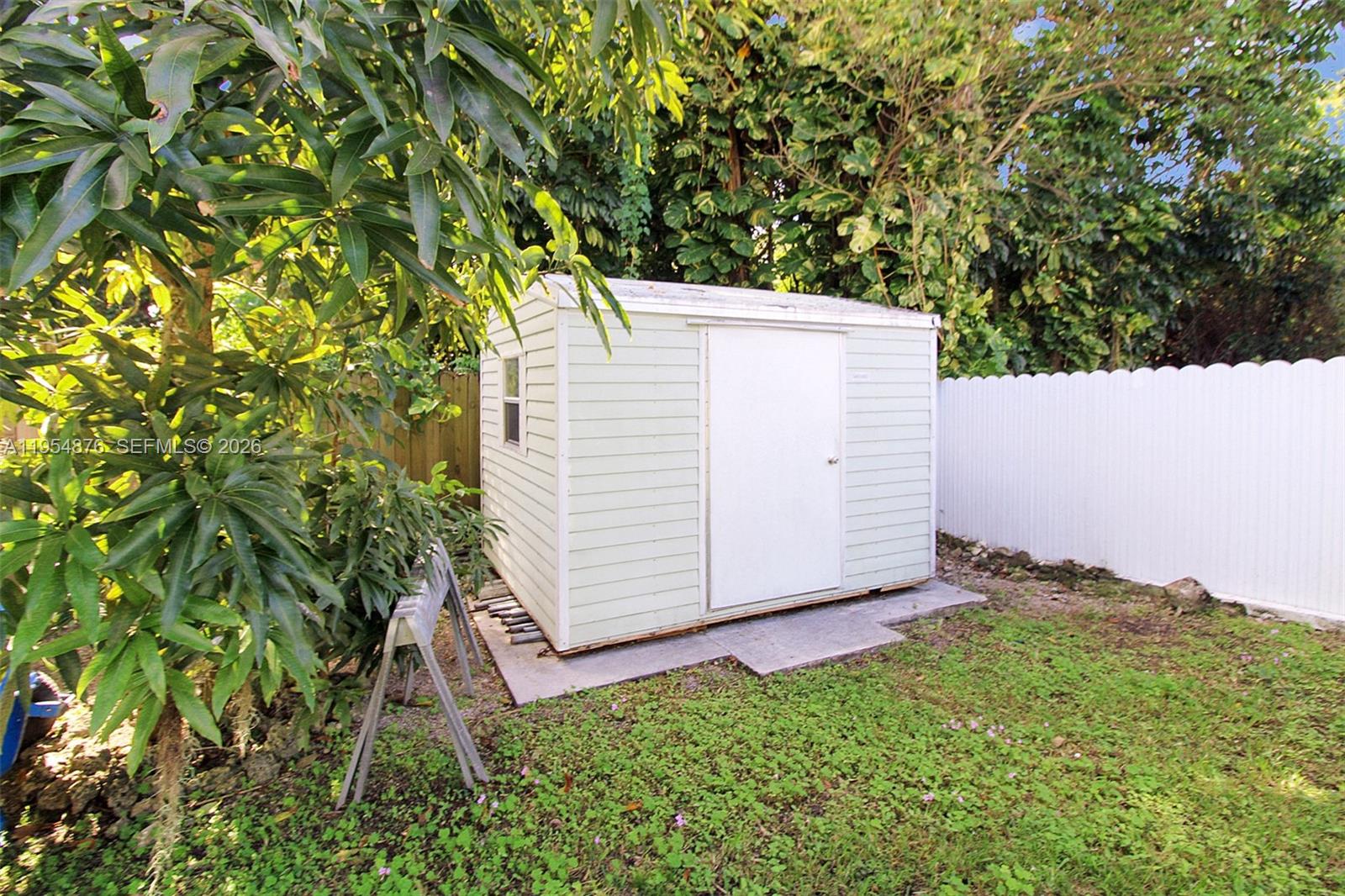 11942 Southwest 210th Street Miami, FL 33177 - Photo 19 of 19 a view of a backyard