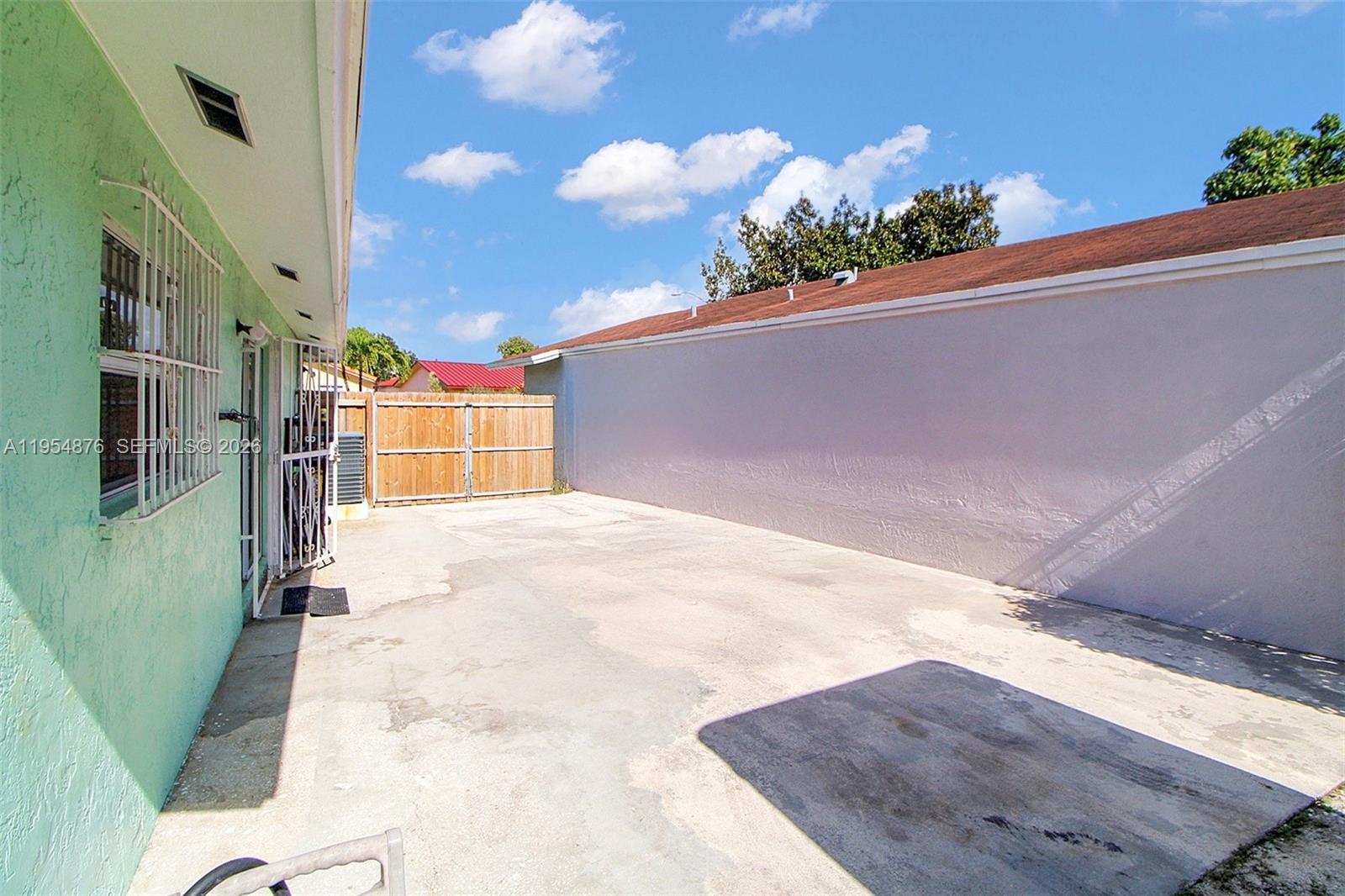 11942 Southwest 210th Street Miami, FL 33177 - Photo 3 of 19 a view of a backyard