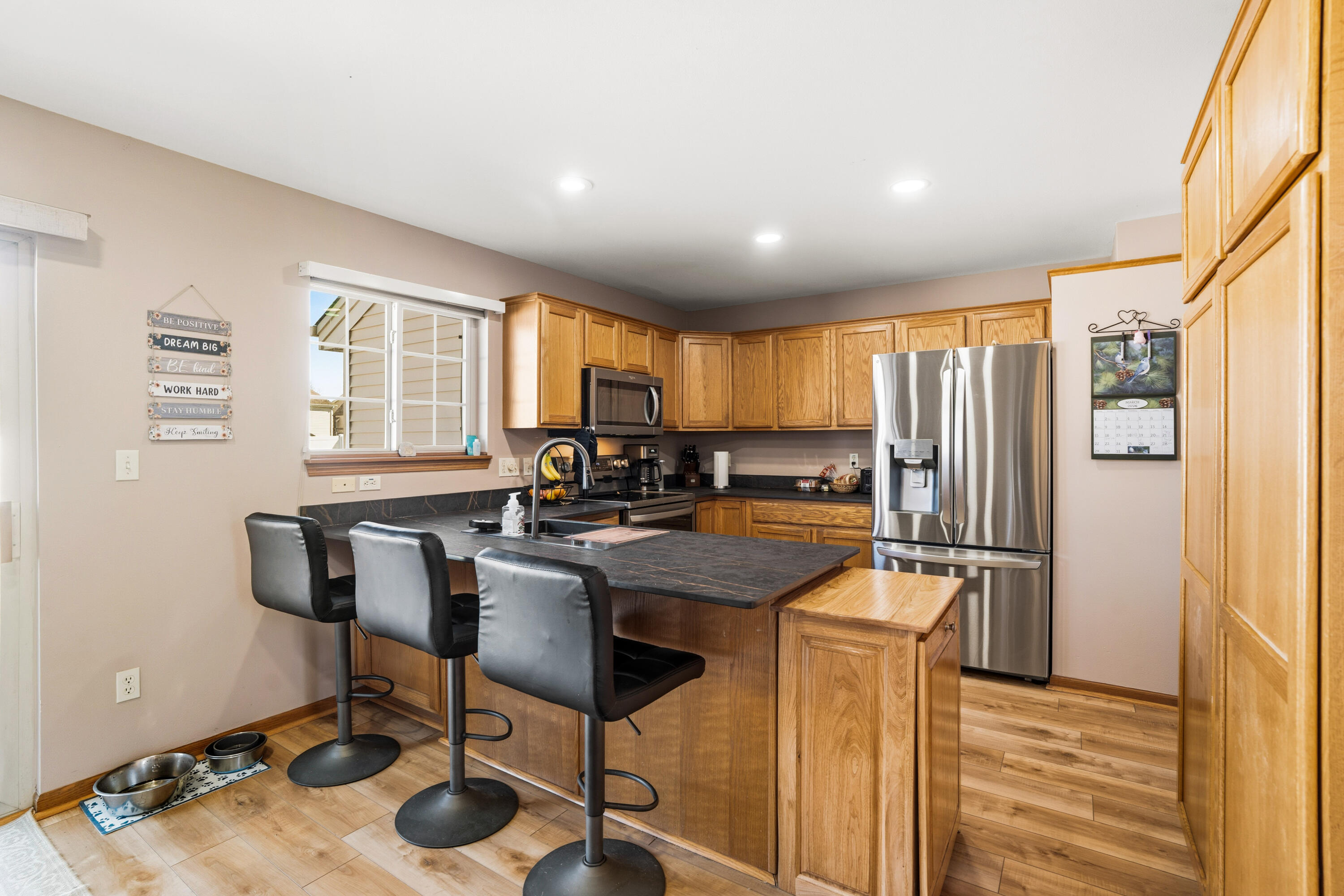 3533 Rivers Crossing Drive Waukesha, WI 53189 - Photo 11 of 27 Raised Oak panel Cabinets