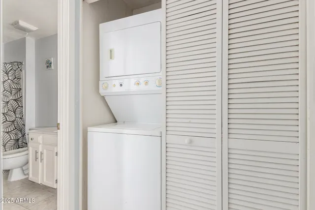 a bathroom with a toilet and a sink