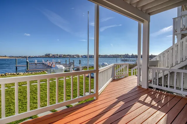 a kitchen with stainless steel appliances granite countertop a refrigerator and a stove