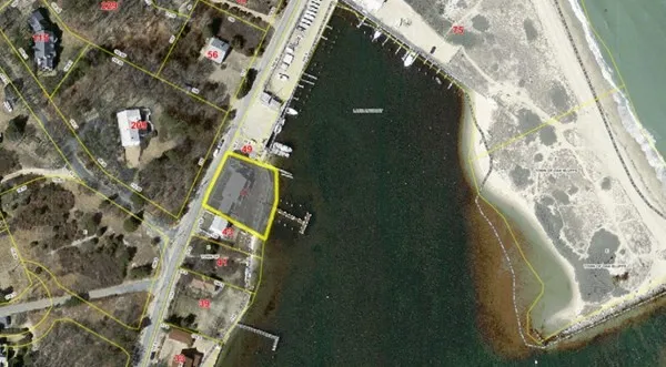 a bed room with two beds and a large window