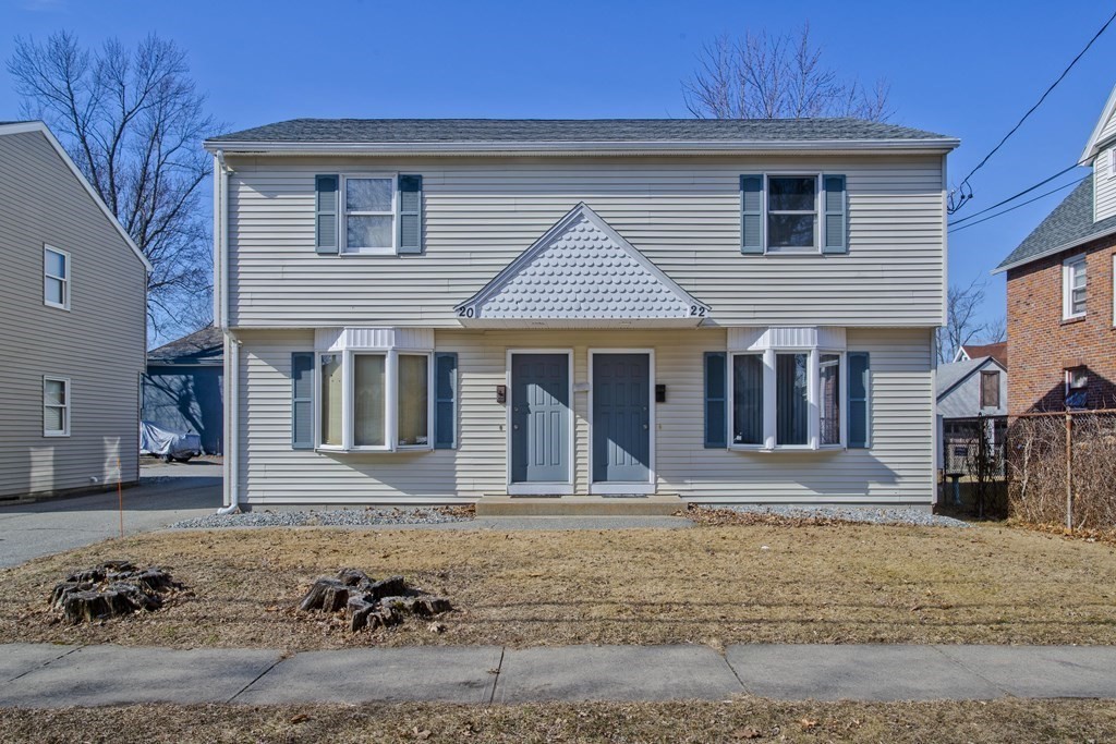 20-22 Gold Street Springfield, MA 01107 - Photo 1 of 27 a front view of a house with a yard