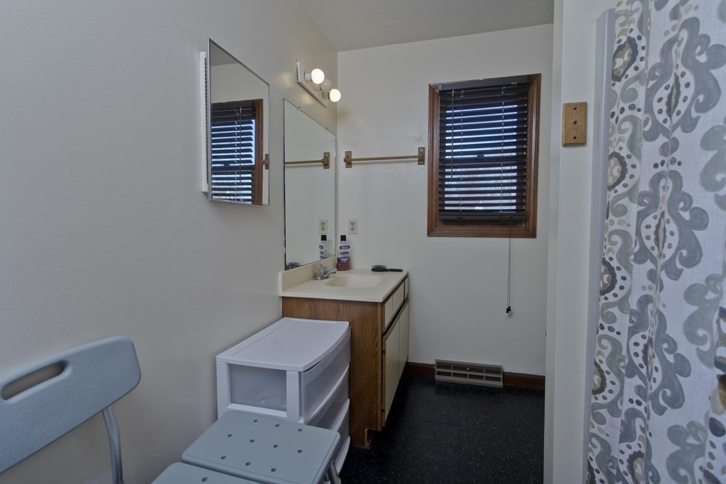 20-22 Gold Street Springfield, MA 01107 - Photo 11 of 27 a bathroom with a sink toilet and window