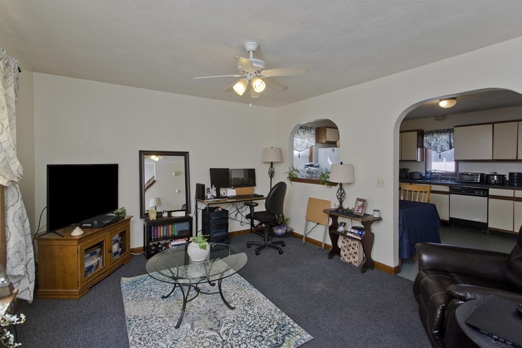 20-22 Gold Street Springfield, MA 01107 - Photo 12 of 27 a living room with furniture and a flat screen tv