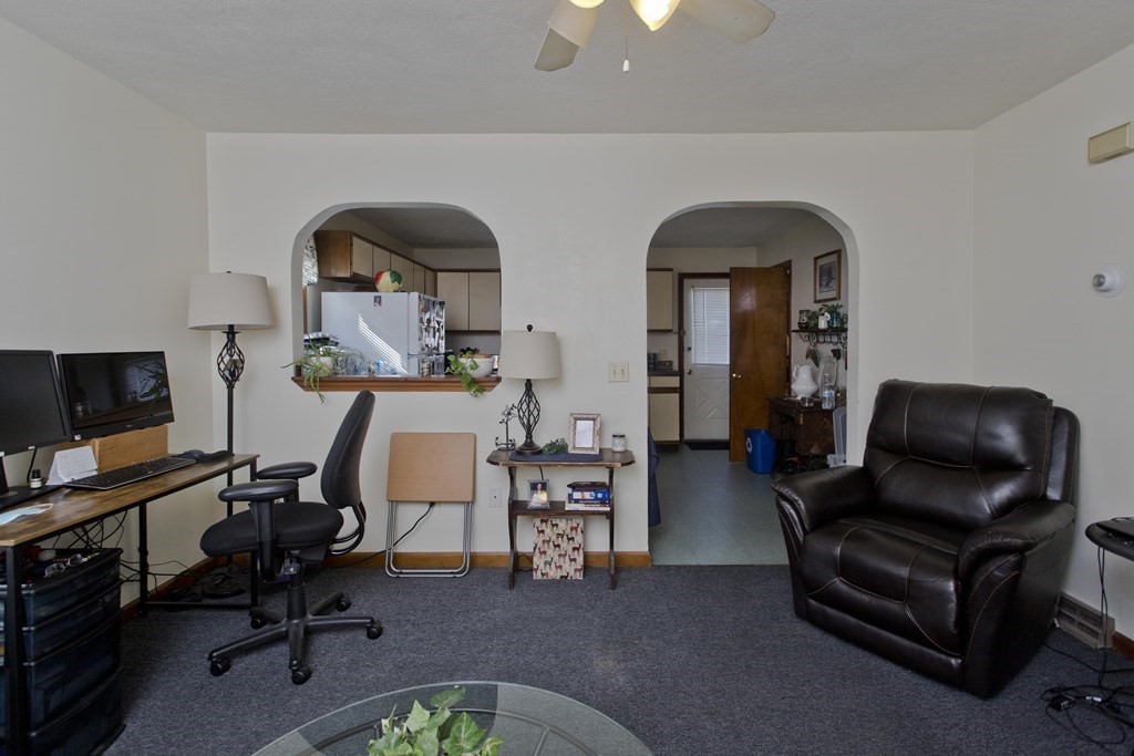 20-22 Gold Street Springfield, MA 01107 - Photo 13 of 27 a living room with furniture and a flat screen tv