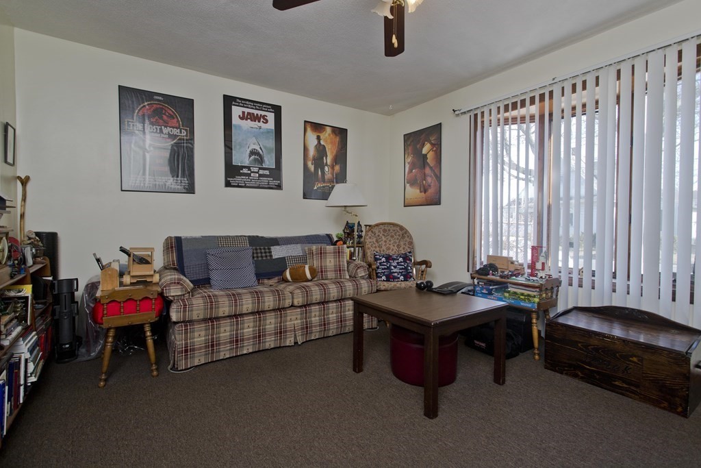 20-22 Gold Street Springfield, MA 01107 - Photo 18 of 27 a living room with furniture and a window