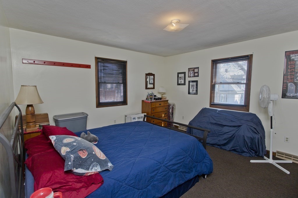 20-22 Gold Street Springfield, MA 01107 - Photo 25 of 27 a bedroom with two beds and a window
