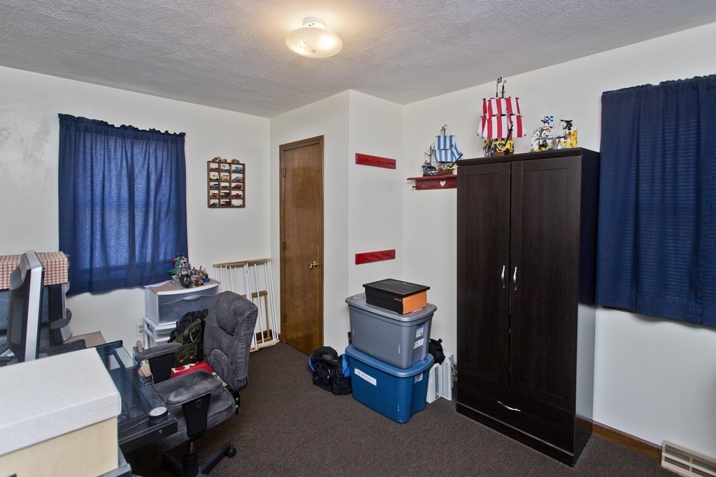 20-22 Gold Street Springfield, MA 01107 - Photo 27 of 27 a room with furniture and wooden equipment