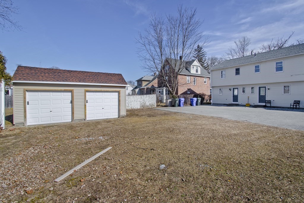 20-22 Gold Street Springfield, MA 01107 - Photo 6 of 27 a front view of a building with large trees