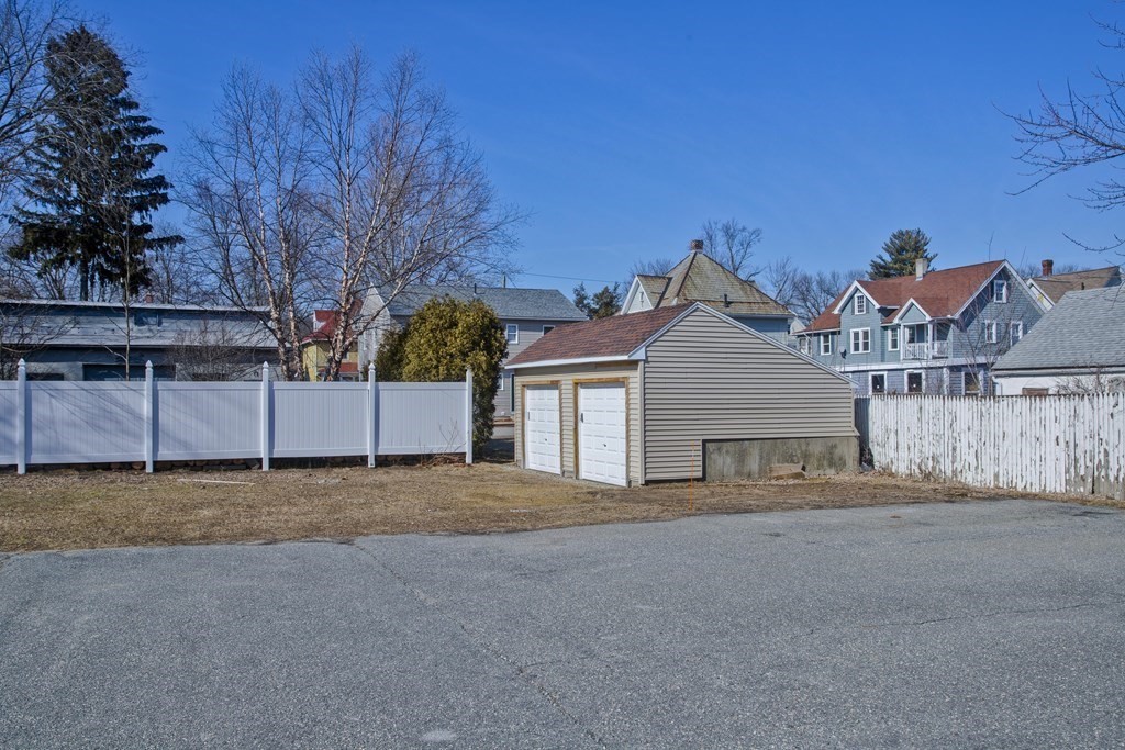 20-22 Gold Street Springfield, MA 01107 - Photo 7 of 27 a view of a house with a yard