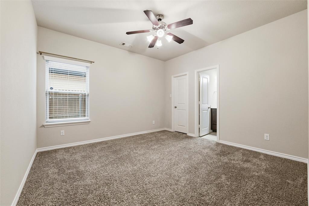 420 Prairie Run Aledo, TX 76008 - Photo 29 of 38 an empty room with windows and fan