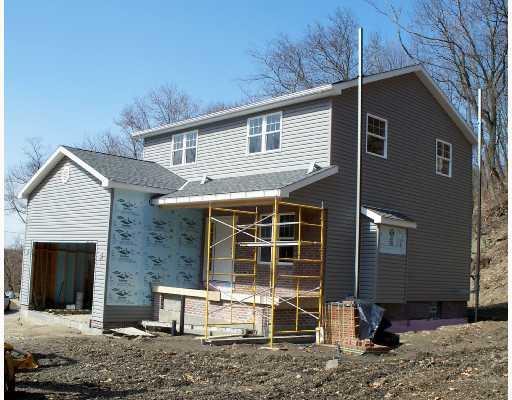 Lot #3 Cliffview Road Pittsburgh, PA 15212 - Photo 2 of 8 Exterior Front. Concrete Driveway & Walks, Front Porch & Seeded Level Lot to be completed within weeks!