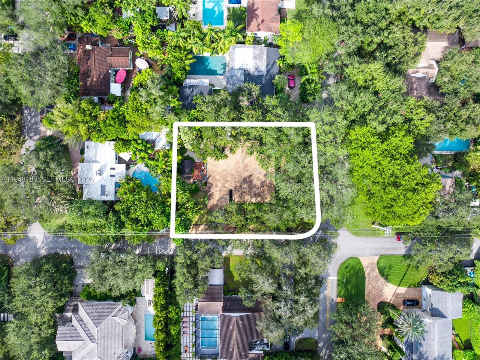 5335 Southwest 74th Street Miami, FL 33143 - Photo 2 of 12 an outdoor view from a garden