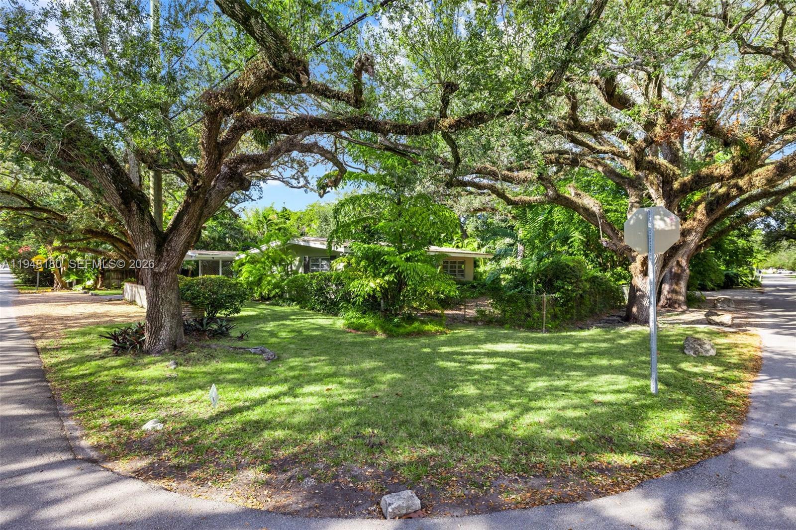 5335 Southwest 74th Street Miami, FL 33143 - Photo 4 of 12 a view of a trees in a yard