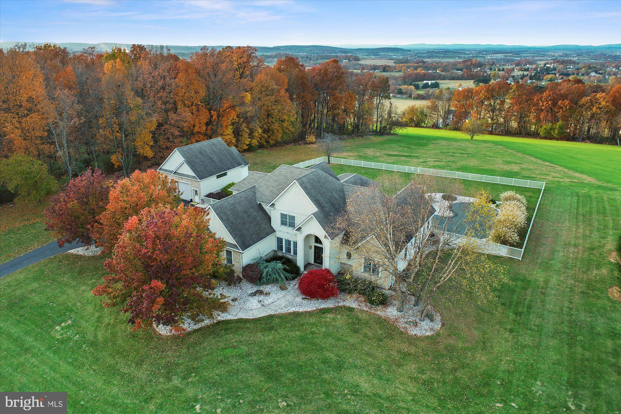 4549 Walters Hatchery Road Spring Grove, PA 17362 - Photo 1 of 64 a view of a golf course with chairs