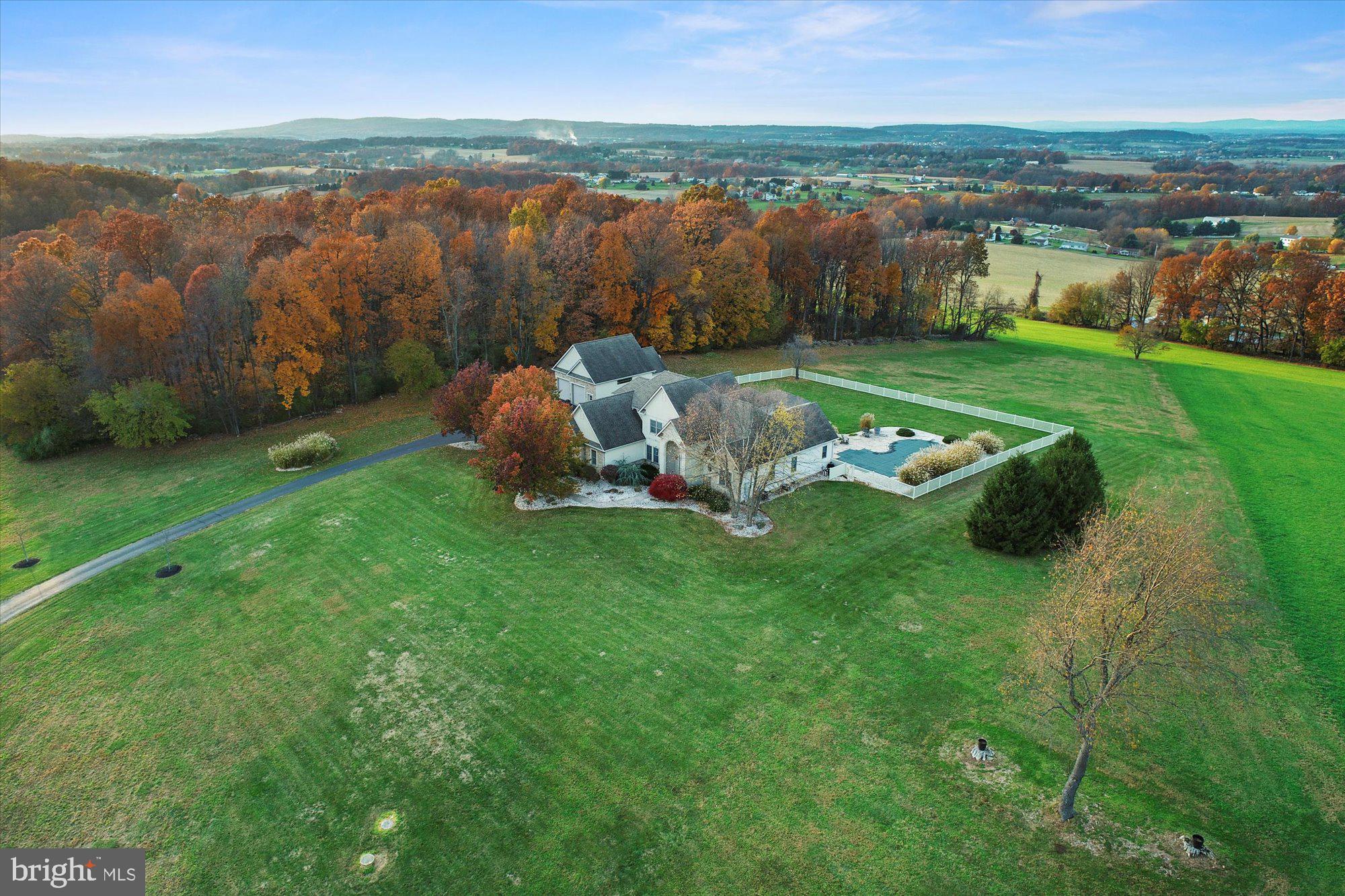 4549 Walters Hatchery Road Spring Grove, PA 17362 - Photo 3 of 64 a view of a lake with houses in the back