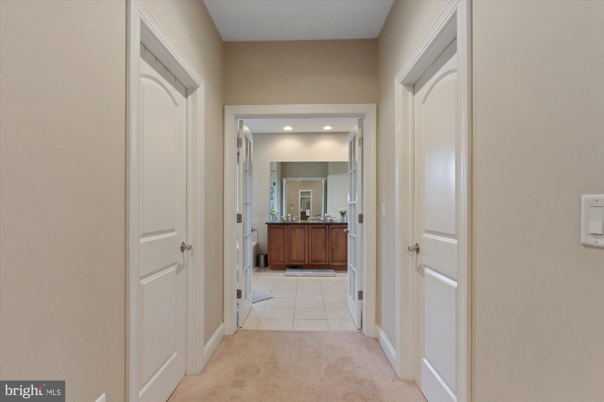4549 Walters Hatchery Road Spring Grove, PA 17362 - Photo 22 of 64 a view of a hallway to a livingroom and a couch