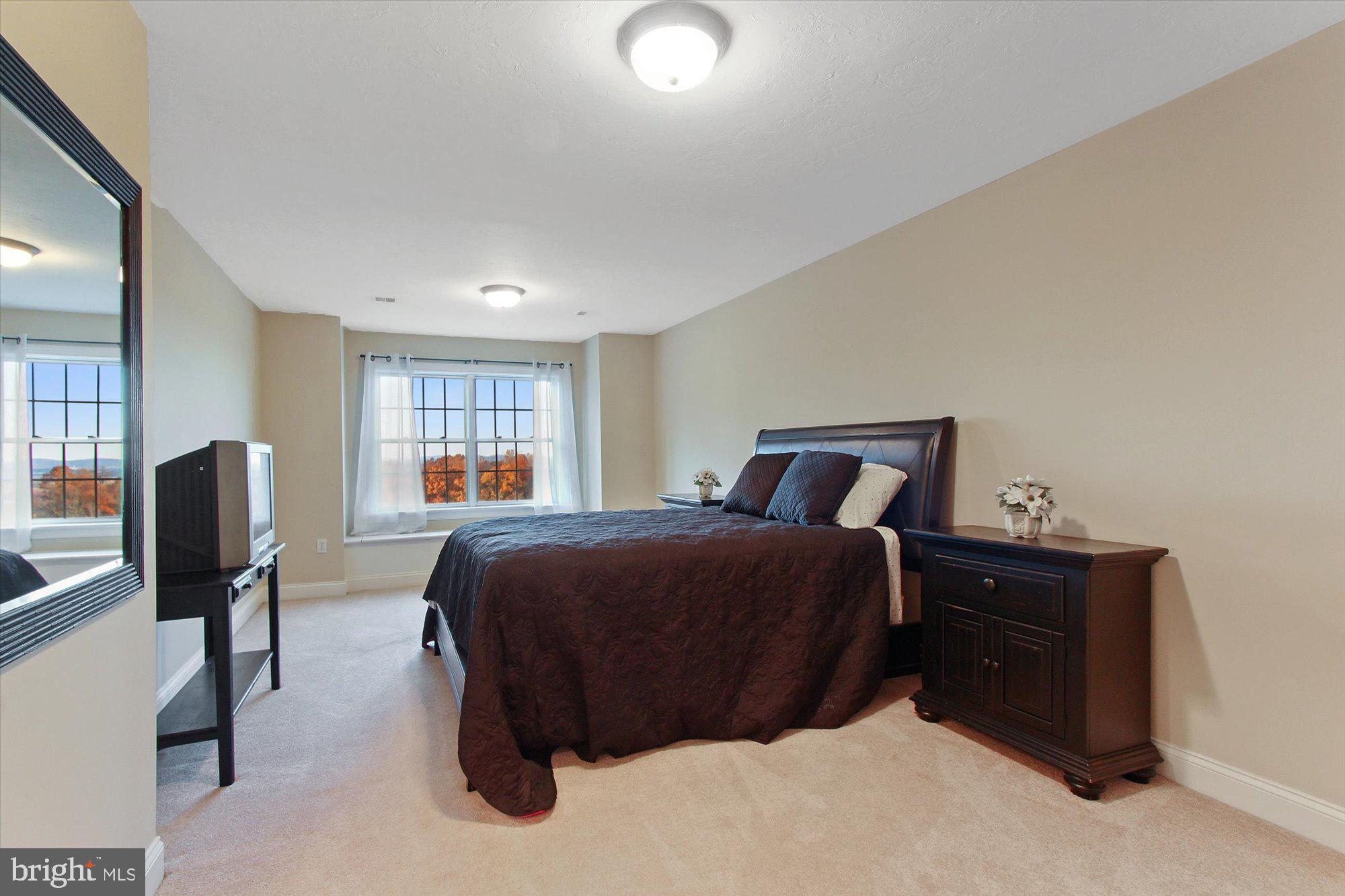 4549 Walters Hatchery Road Spring Grove, PA 17362 - Photo 28 of 64 a bedroom with a bed and window