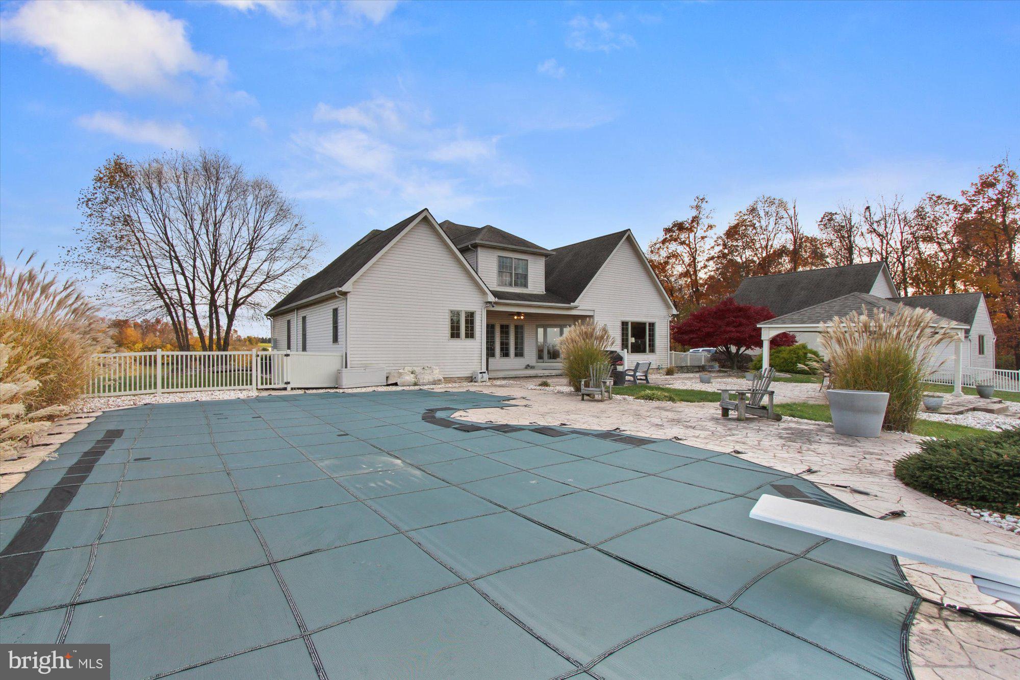 4549 Walters Hatchery Road Spring Grove, PA 17362 - Photo 49 of 64 a view of house and outdoor space with swimming pool