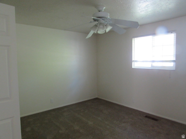 3166 Linden Street Bountiful, UT 84010 - Photo 11 of 25 Bedroom featuring a ceiling fan and new carpet