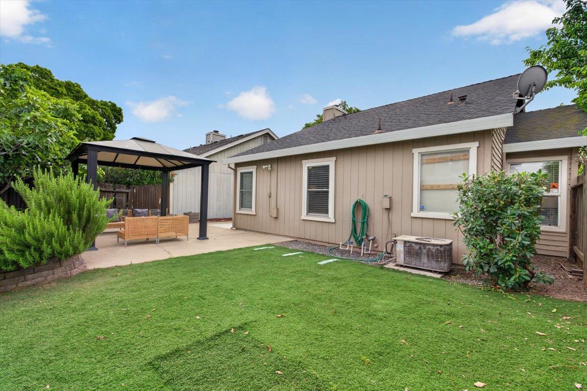 4353 Country Run Way Antelope, CA 95843 - Photo 24 of 28 a view of a house with a backyard and a porch