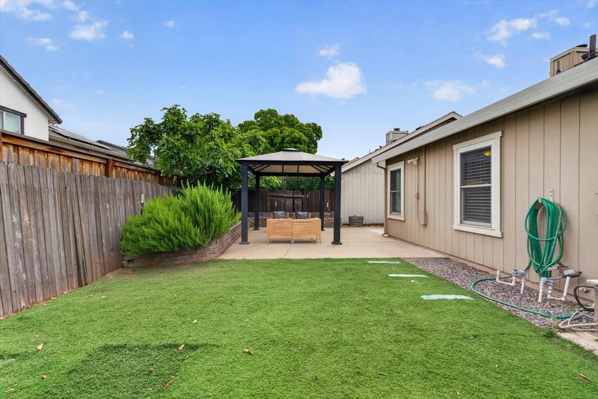 4353 Country Run Way Antelope, CA 95843 - Photo 25 of 28 a view of a house with backyard and sitting area