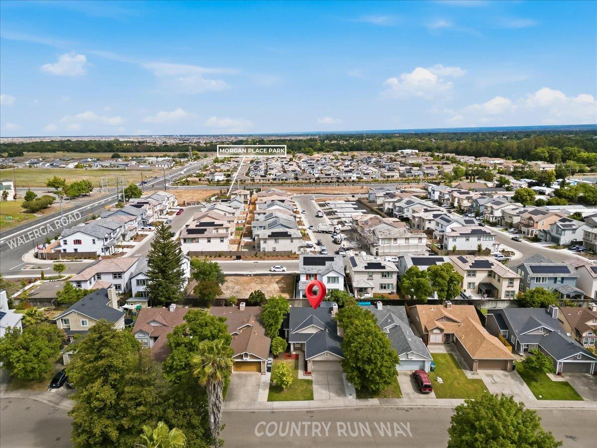 4353 Country Run Way Antelope, CA 95843 - Photo 27 of 28 an aerial view of a city with lots of residential buildings ocean and mountain view in back