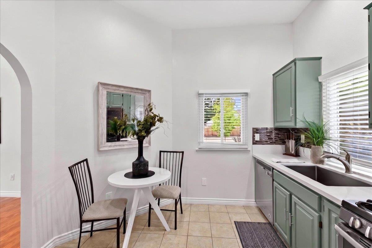 4353 Country Run Way Antelope, CA 95843 - Photo 7 of 28 a kitchen with stainless steel appliances a sink and a table