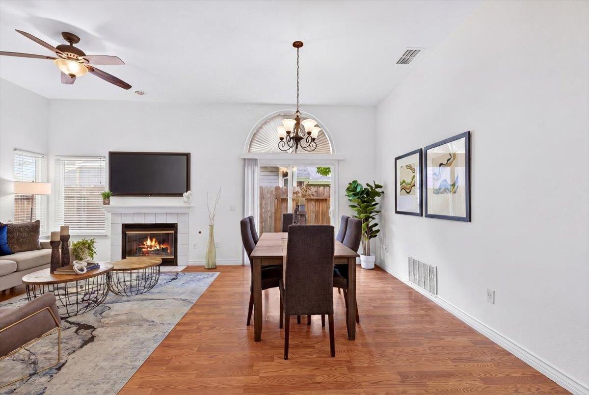 4353 Country Run Way Antelope, CA 95843 - Photo 9 of 28 a view of a a dining room with furniture window and wooden floor