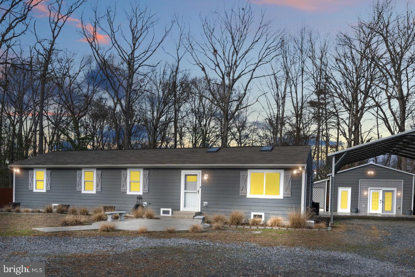 317 Biddle Road Accokeek, MD 20607 - Photo 1 of 44 a front view of a house with a yard