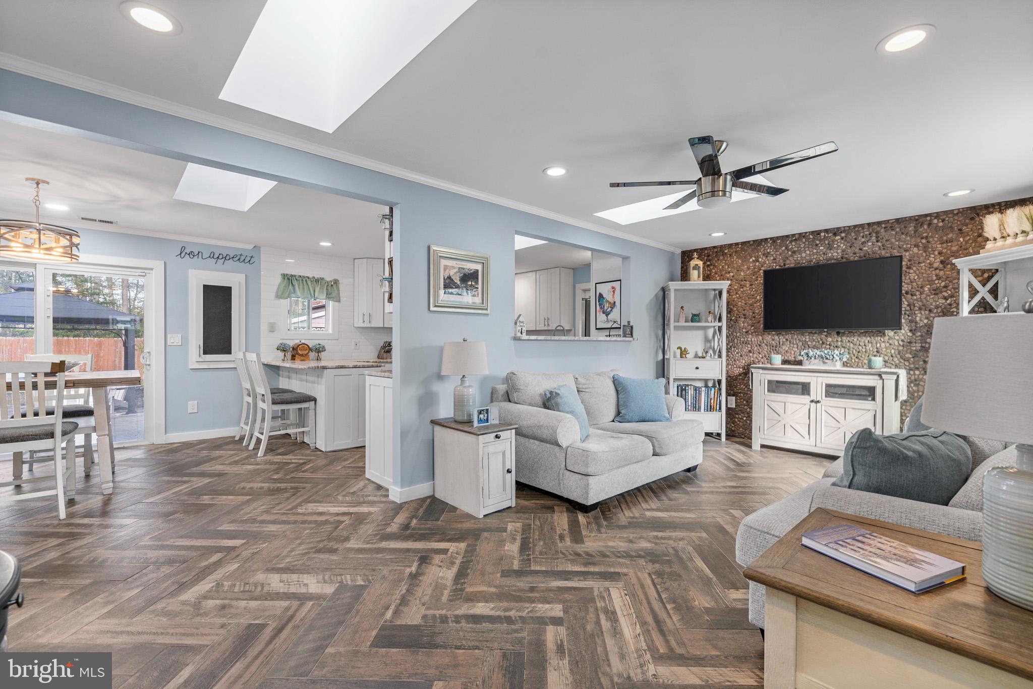 317 Biddle Road Accokeek, MD 20607 - Photo 2 of 44 a living room with furniture and a flat screen tv