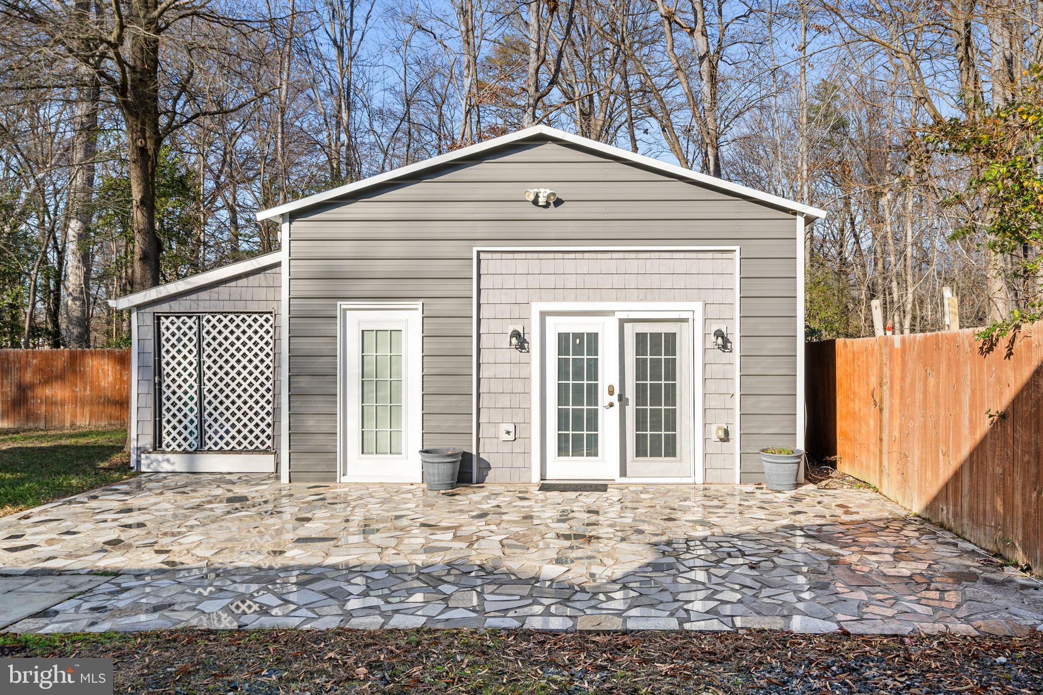 317 Biddle Road Accokeek, MD 20607 - Photo 23 of 44 a front view of a house with a yard