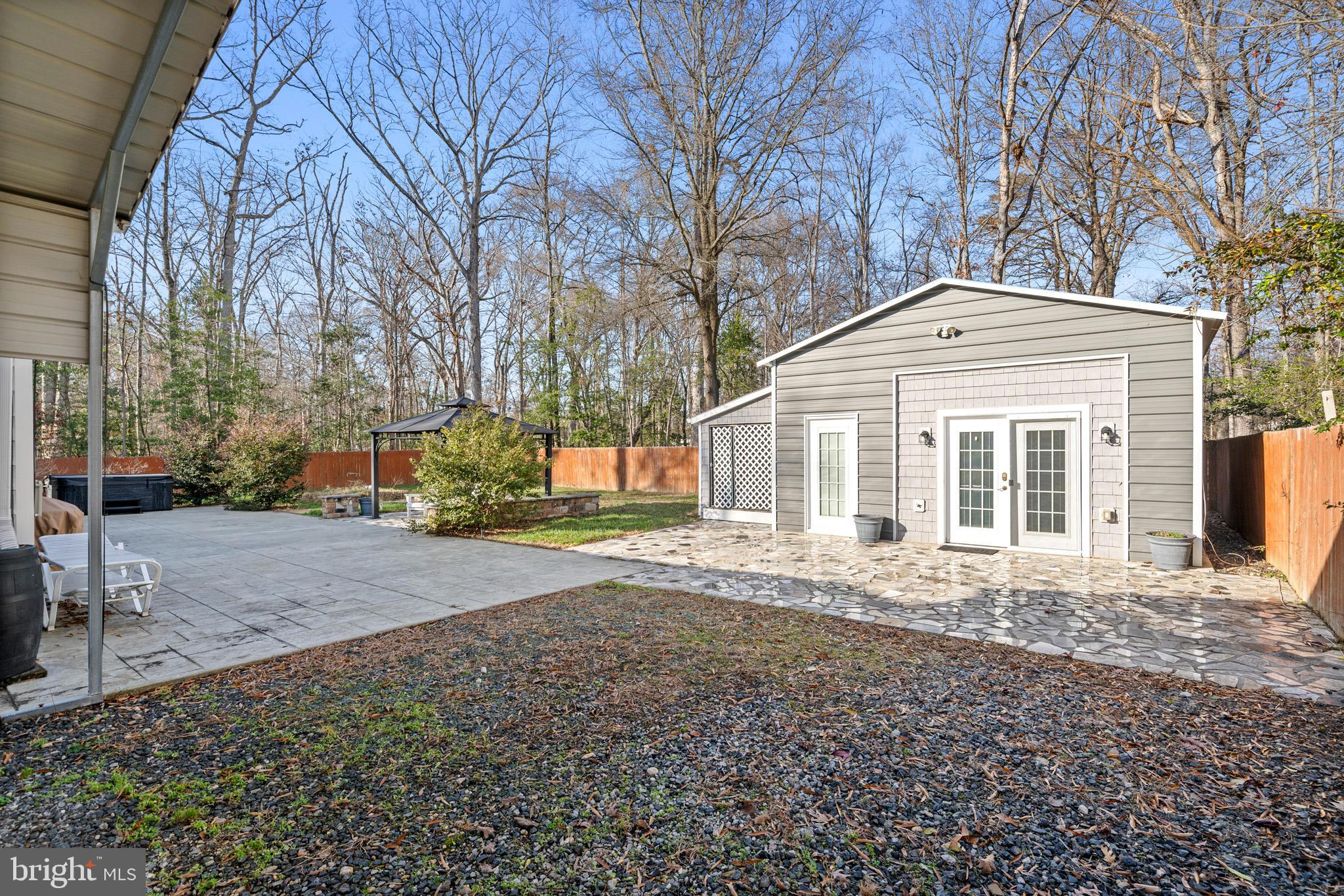 317 Biddle Road Accokeek, MD 20607 - Photo 31 of 44 a view of a house with a yard and garage