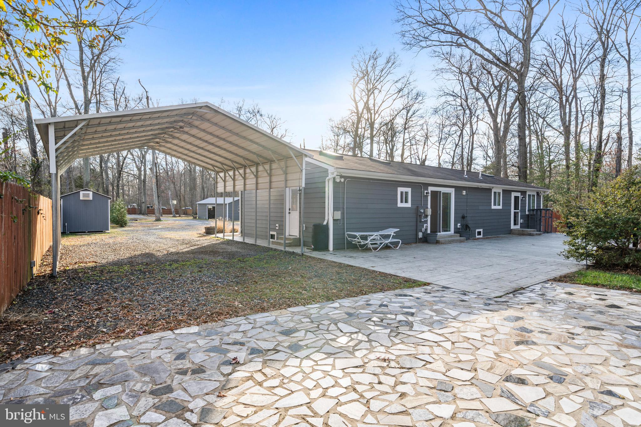 317 Biddle Road Accokeek, MD 20607 - Photo 32 of 44 a view of a house with a yard and trees